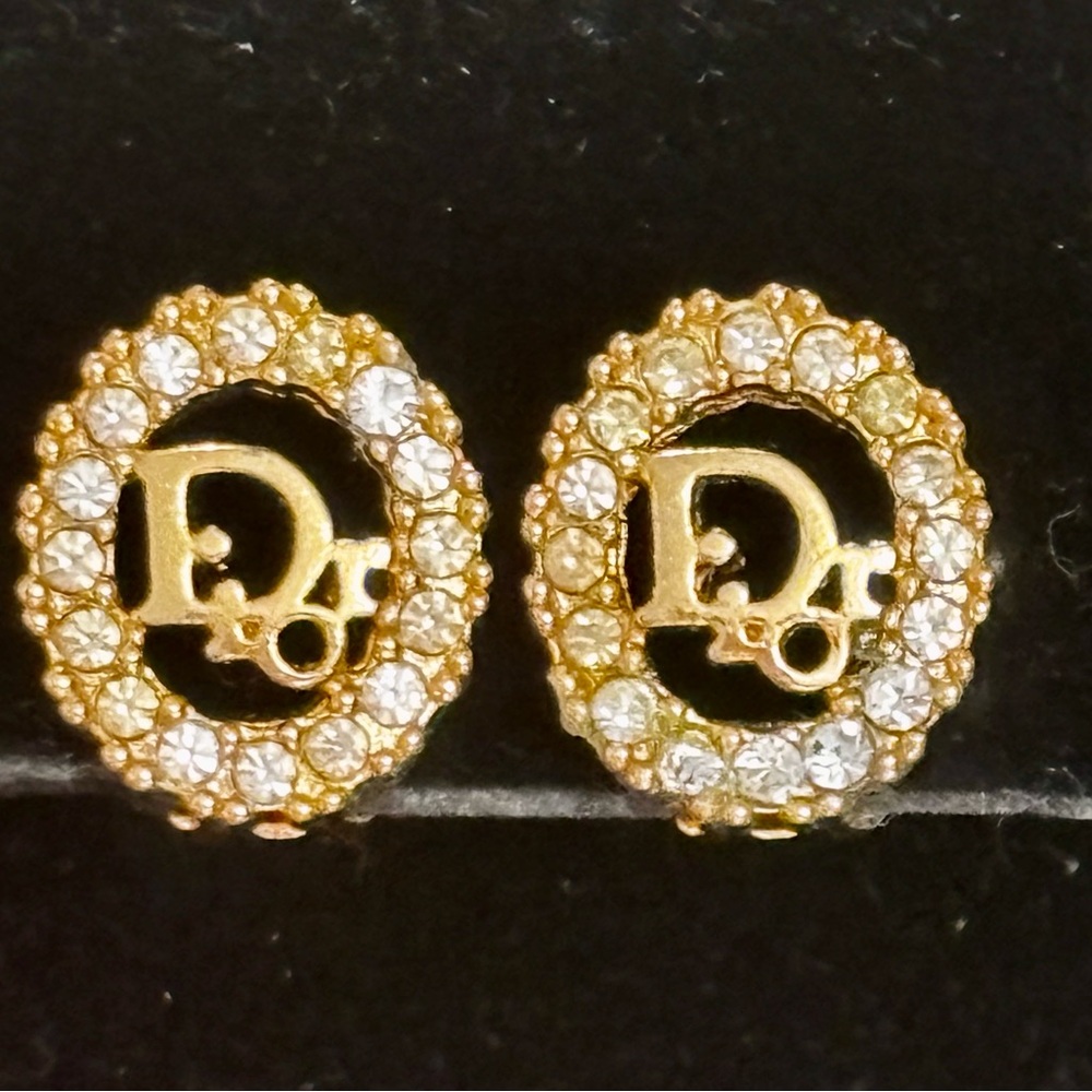 Christian Dior gold-tone clip-on earrings with rhinestone accents Vintage age